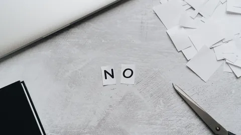 종이 조각으로 쓴 NO 글자