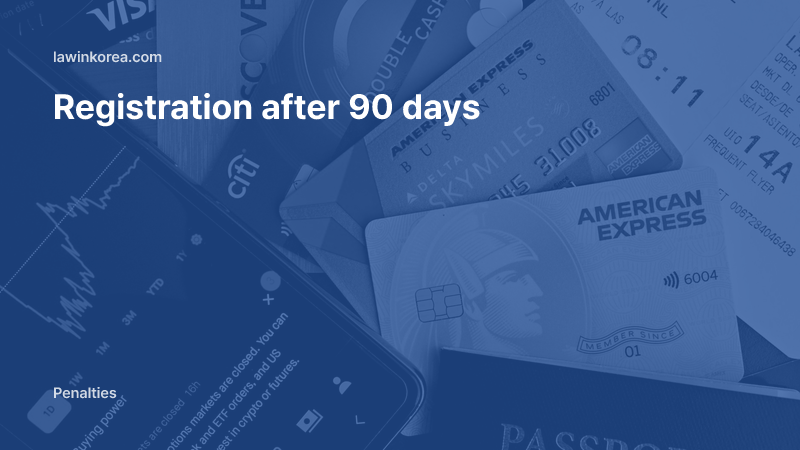 Flat lay of a passport and cards: Didn't Register as a Foreign Resident Within 90 Days of Arrival? Fines and Deportation Risk