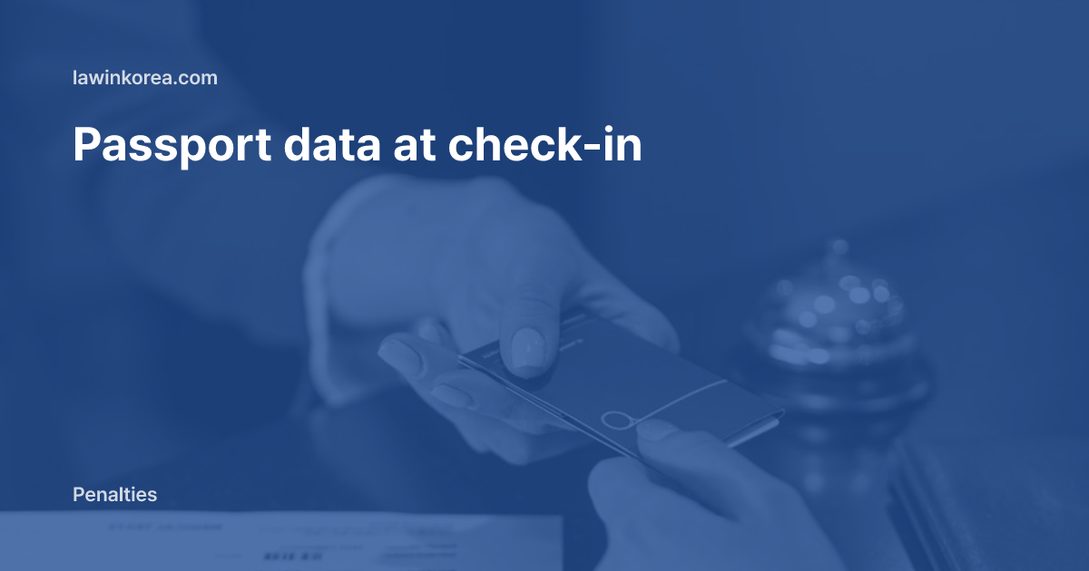 Hotel receptionist handing a key card to a guest: Must You Hand Over Passport Data at a Hotel? Lodging Foreigners' Duty to Provide Information (Article 81-3) and Fines