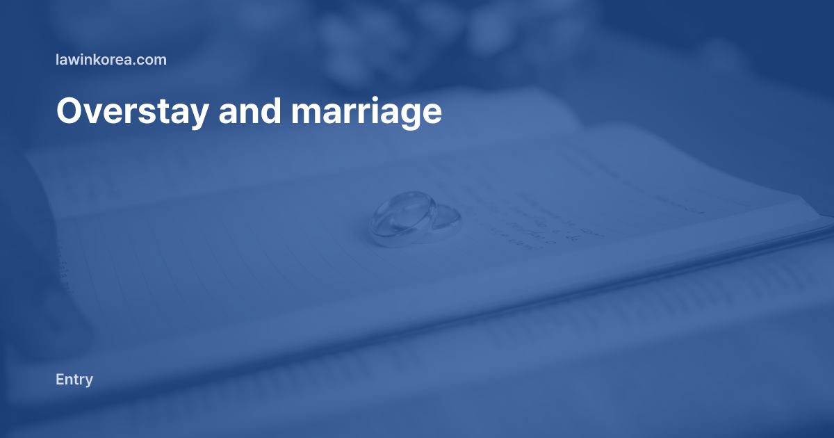Two gold wedding rings resting on an open book: Marrying a Korean After Overstaying: F-6 Status and the Visa Route