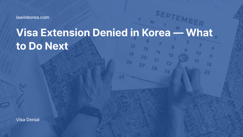Photo of hands marking a deadline on a calendar over documents: Visa Extension Denied in Korea — What to Do Next